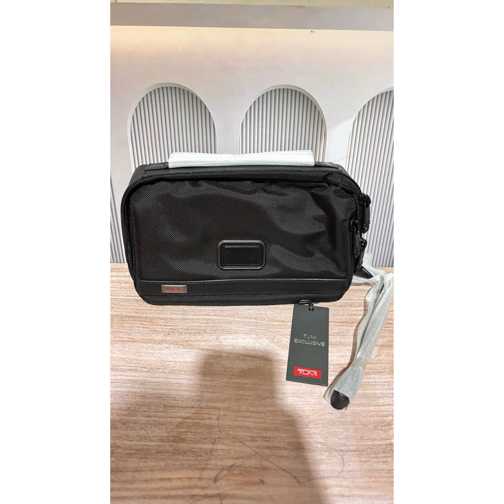 clutch Tumi original