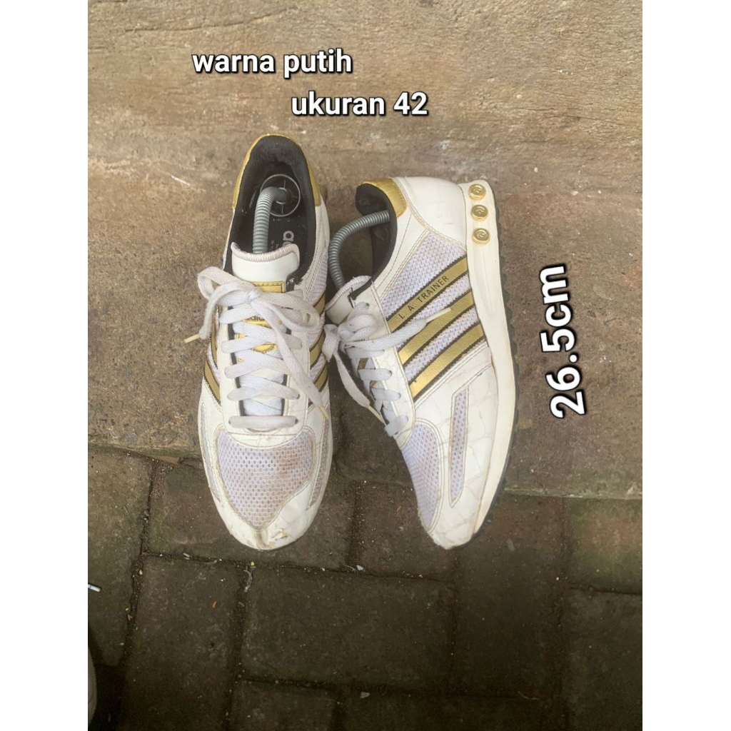 la trainer white gold