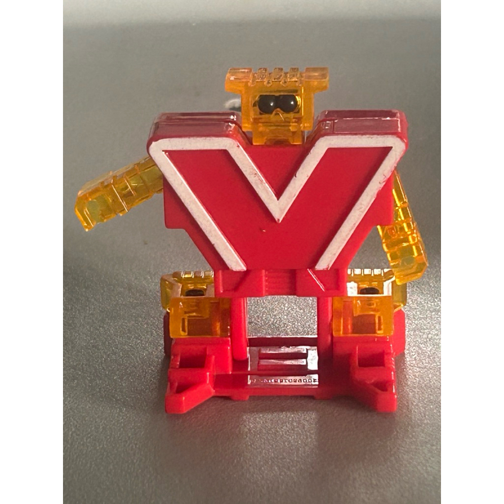 Mainan robot huruf X