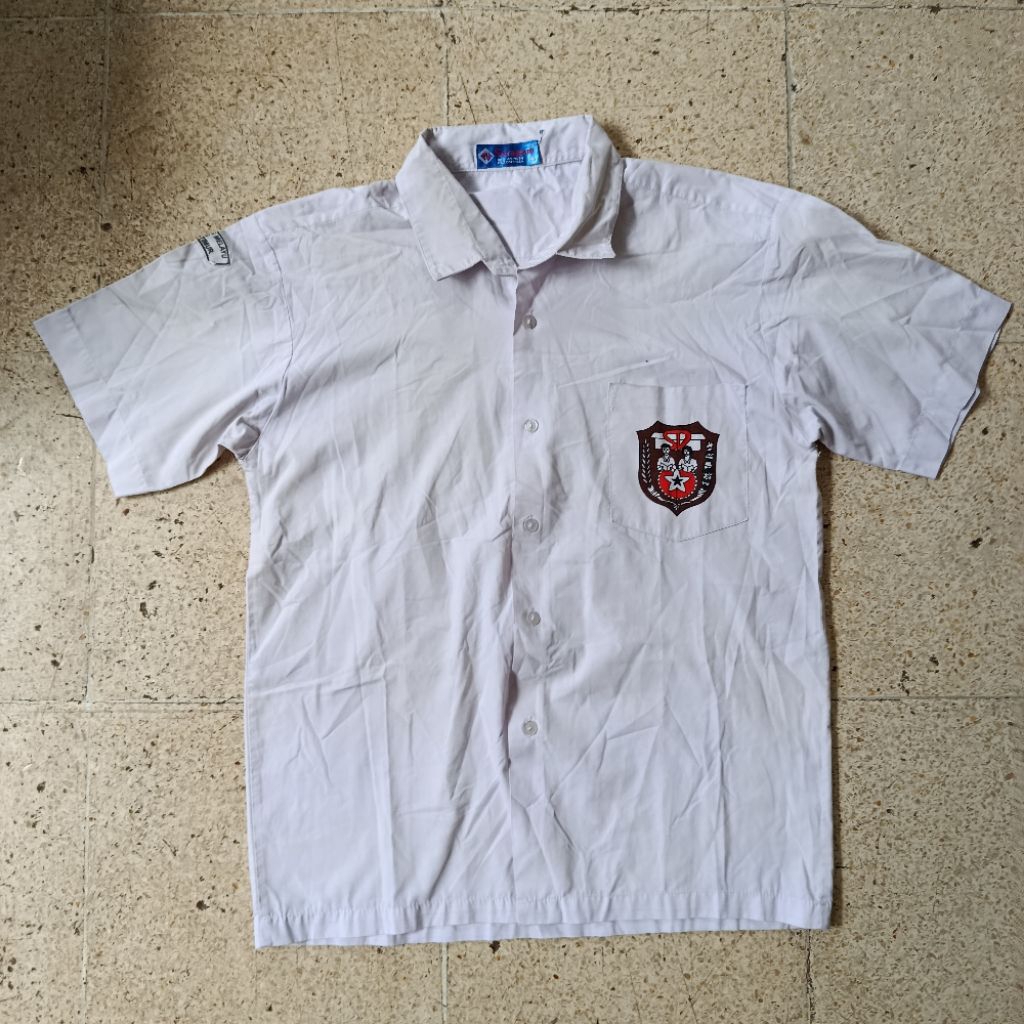 PL baju sekolah putih merk seragam / eagle 73