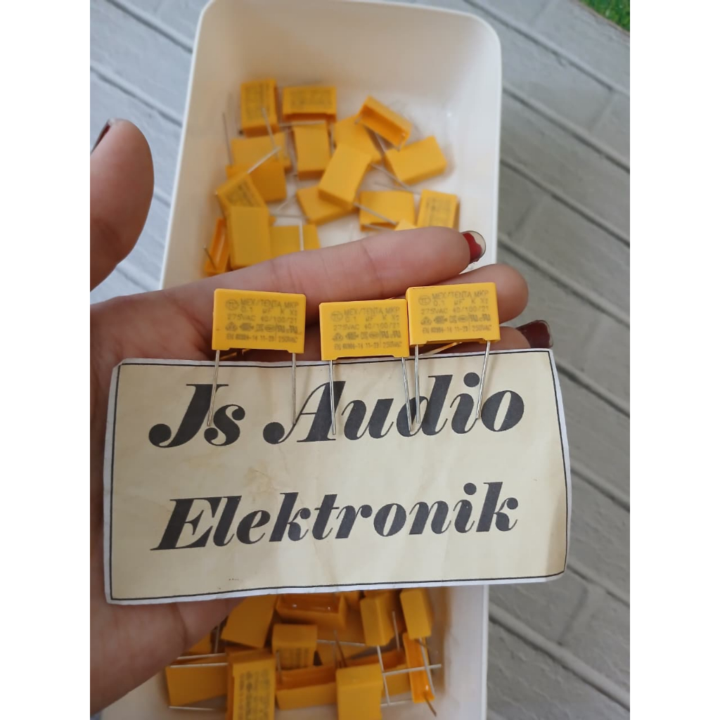 capacitor MKT 100nf 275v  jarak kaki 1,5cm