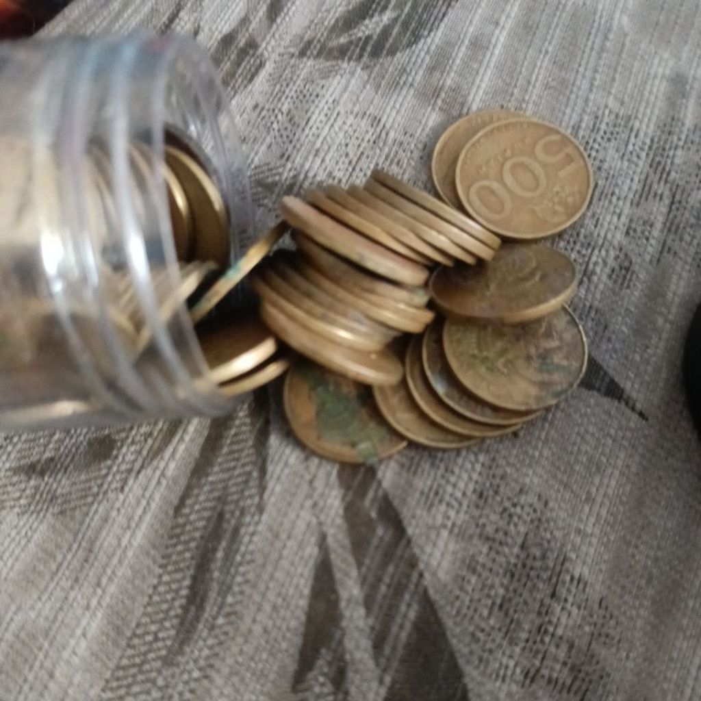 duit receh 500 kuning telah dicuci air mata naga jolotundo