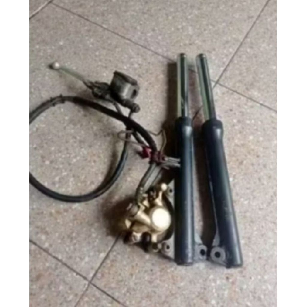 Shockbreaker +kaliper rem depan , Jupiter z robot Vega new original copotan