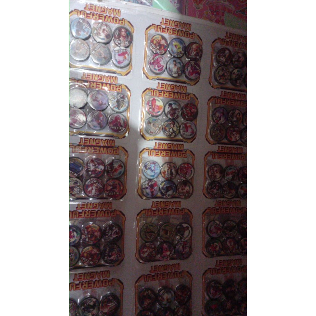 mainan magnet kancing