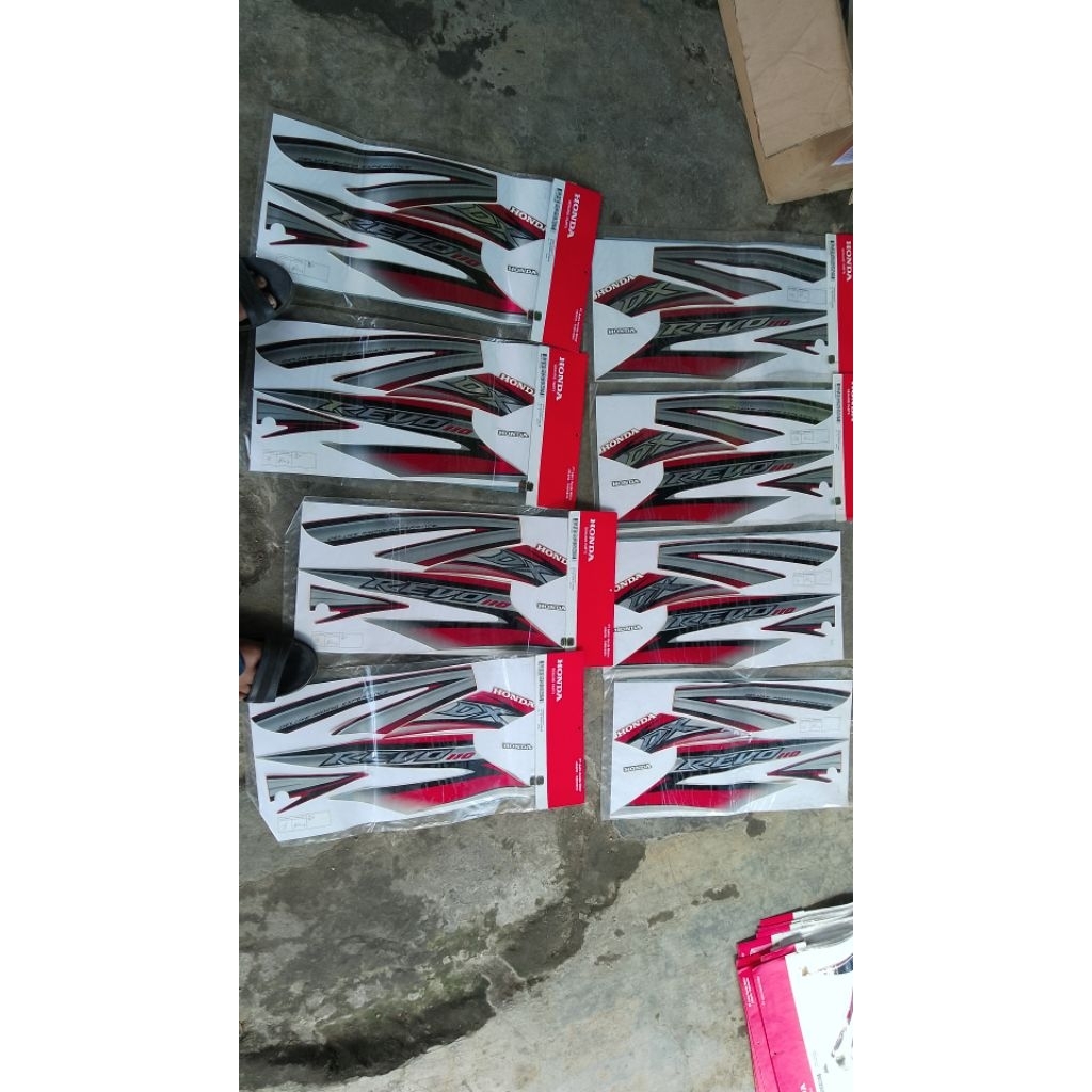 striping revo DX original merah