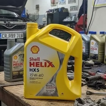 oli shell hx5 4 liter original ( Barcode ) Oli Mesin Shell Helix HX5 SAE 15W-40 4 L Bensin Dan Diese