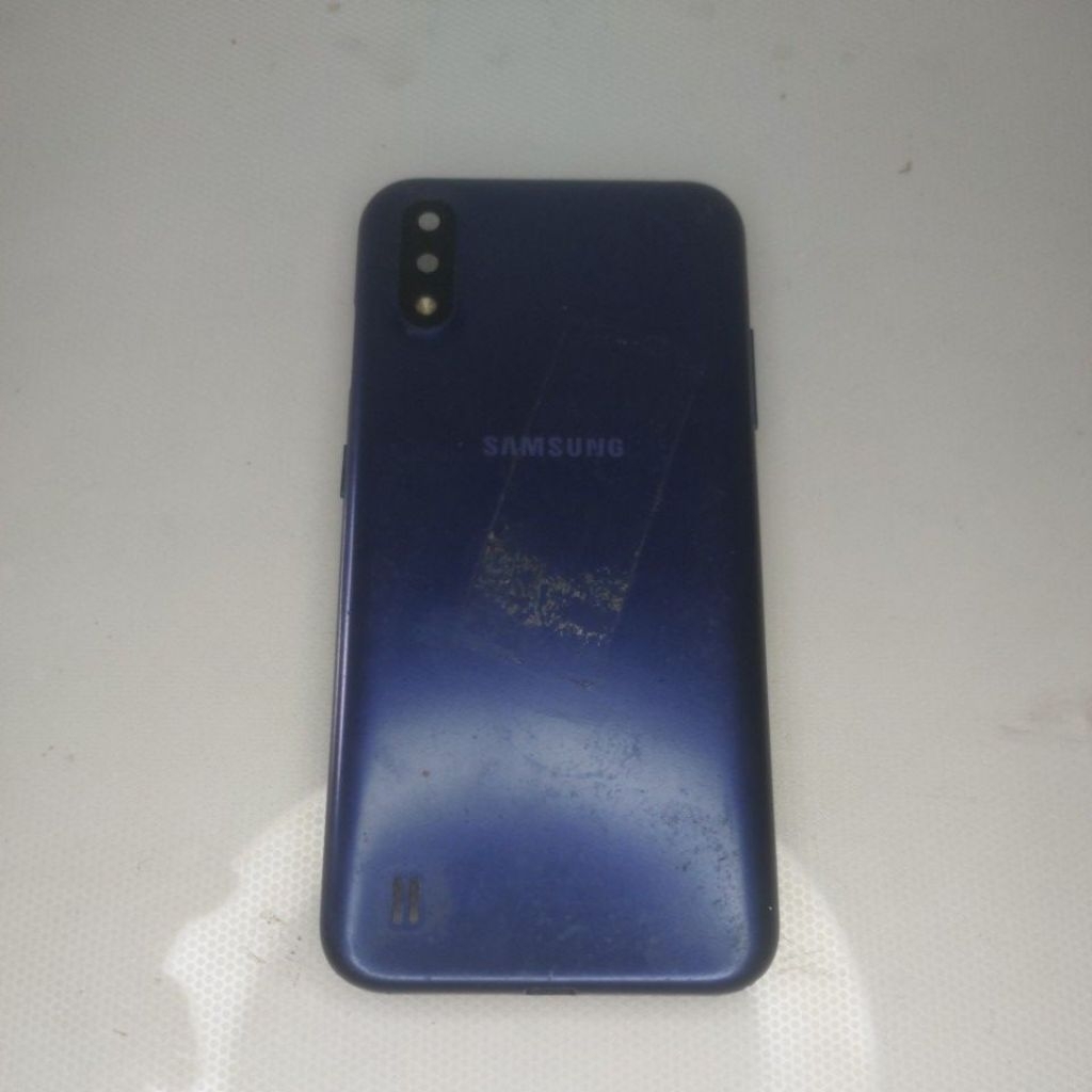 BACKDOOR SAMSUNG A01 BEKAS COPOTAN