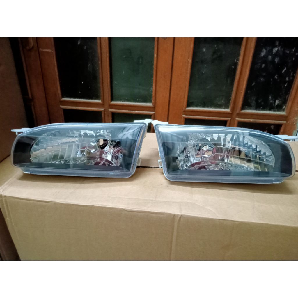Head lamp all new Corolla 96,AE111