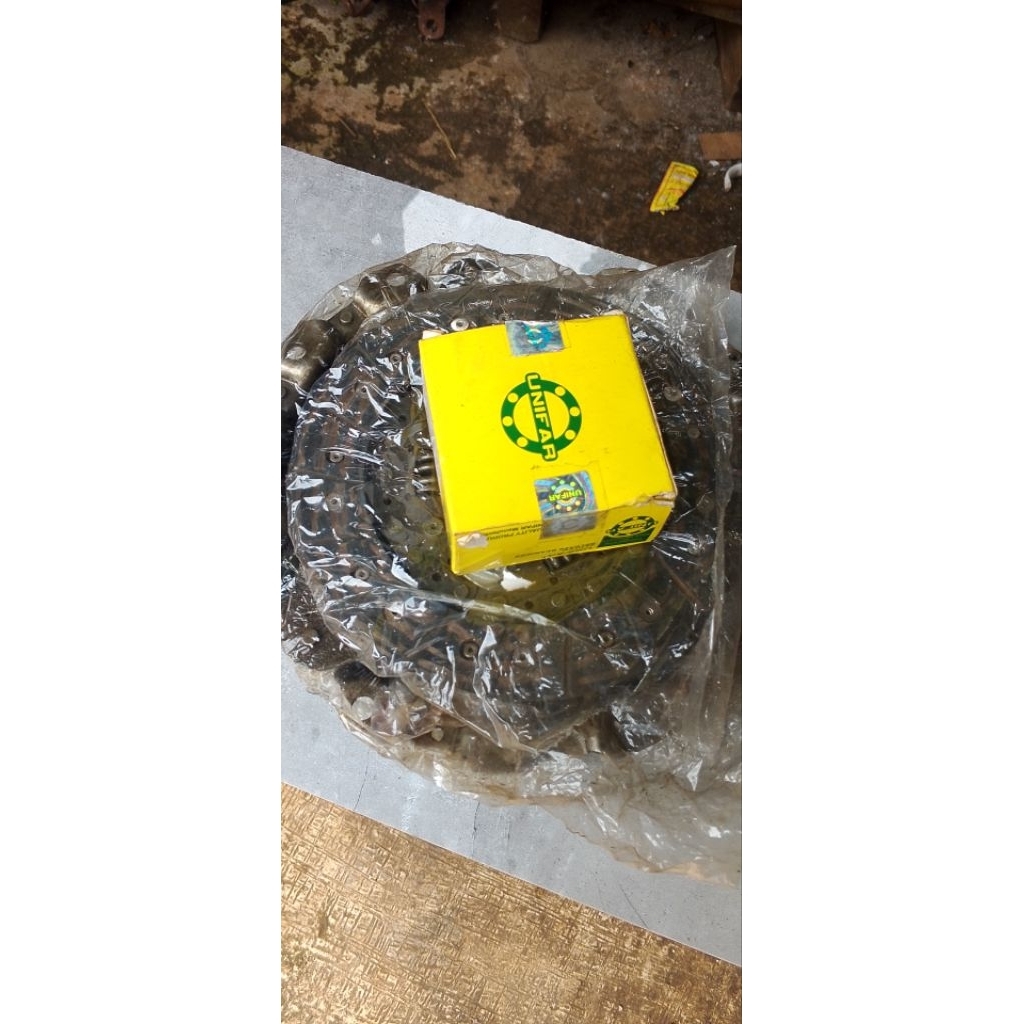 kampas koplinh Mazda 323 elite