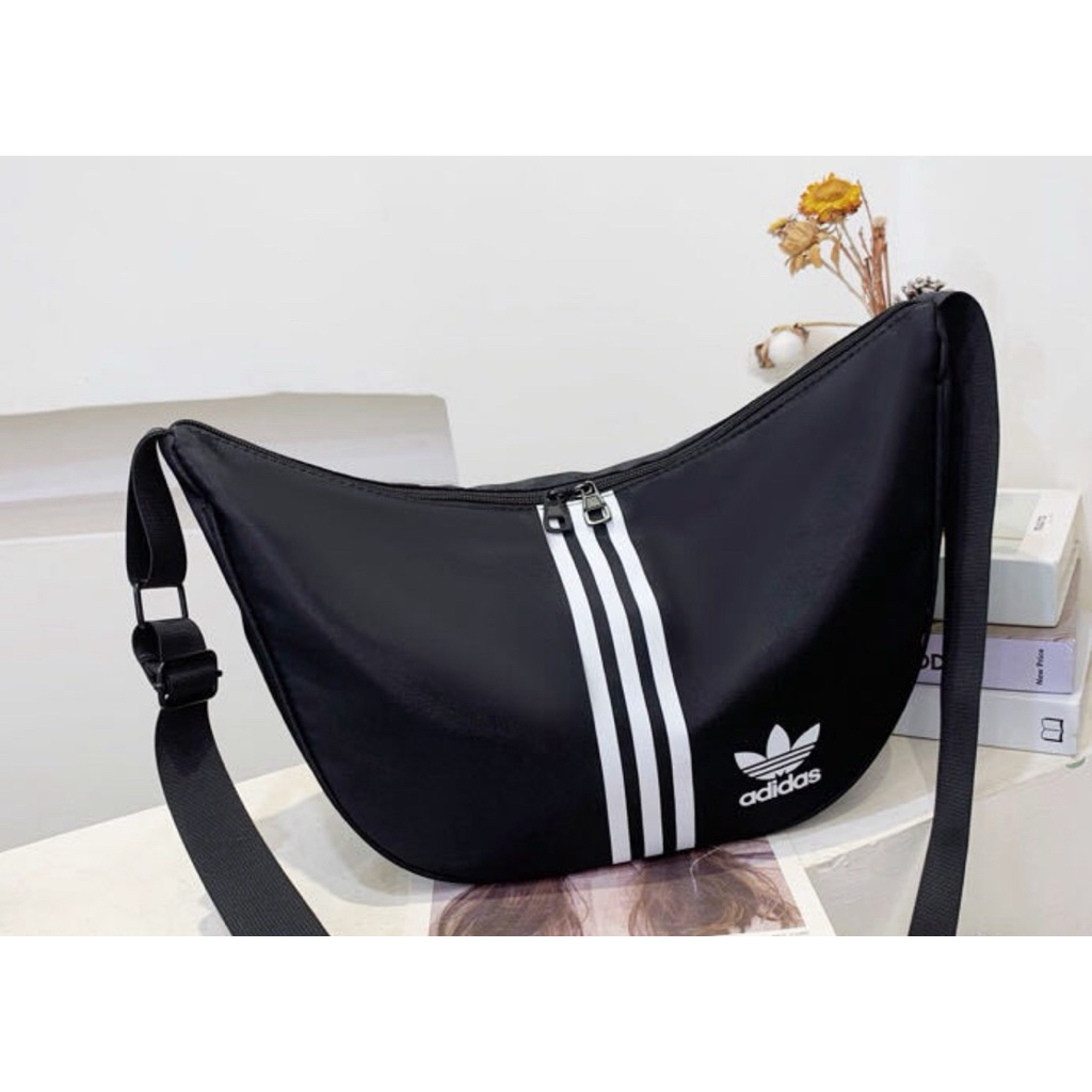 Tas Adidas Ori riject di resleting
