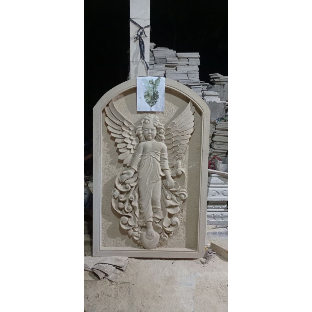 Relief batu alam motif peri