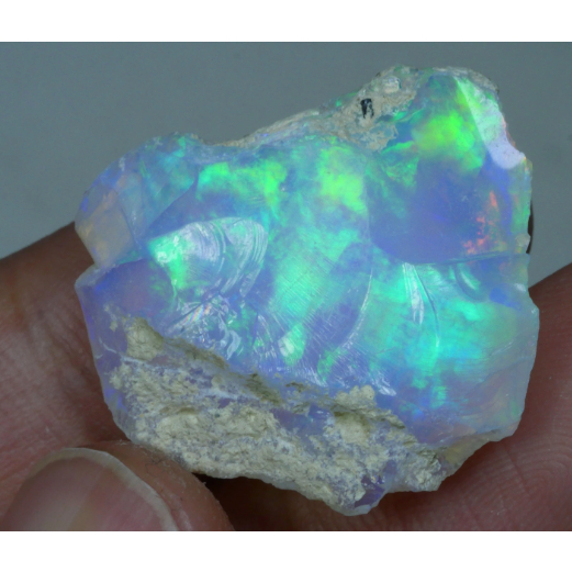 24.56 CRT ETHIOPIAN OPAL ROUGH WELO OPAL PLAY COLOR