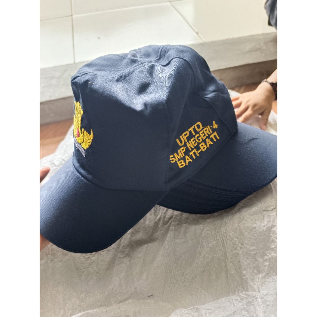 topi SMP bordir bahan drill