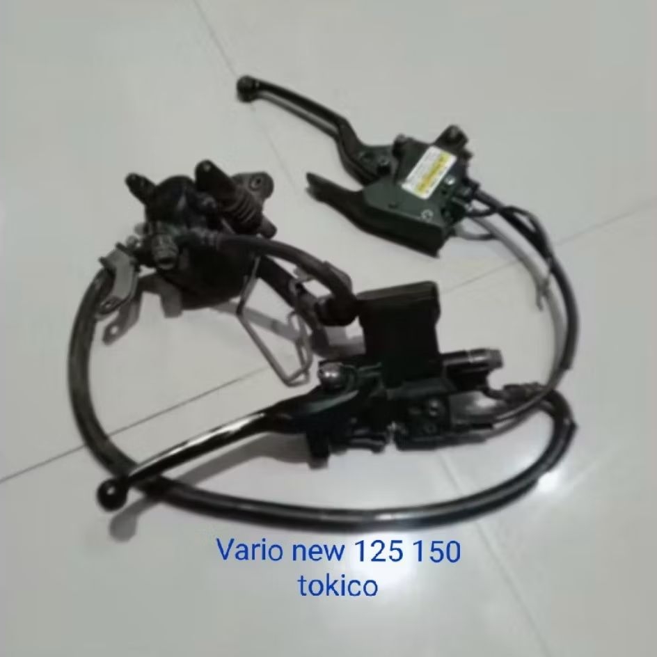 Cakram rem depan komplit Vario new 125 150 tokico