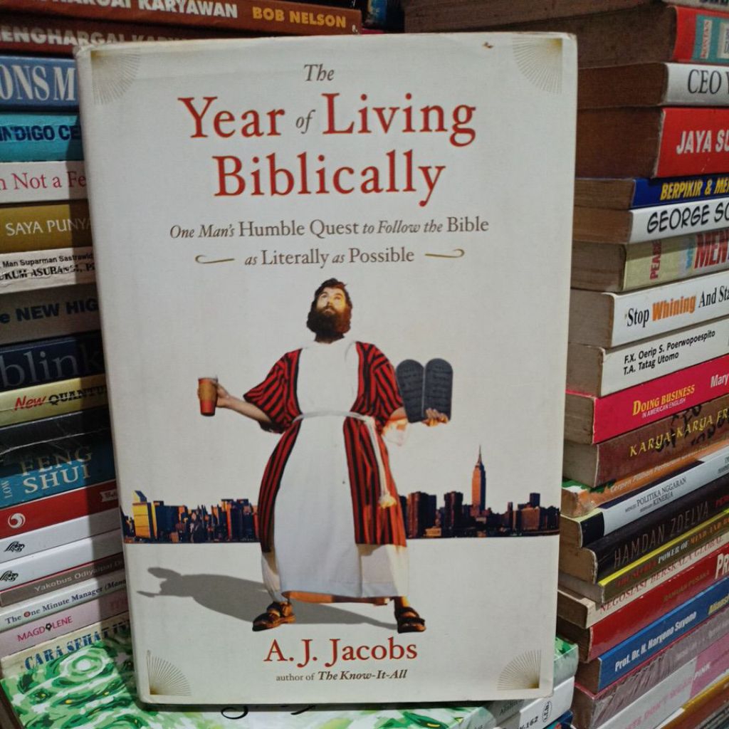Buku the year of living biblically by A J Jacobs
