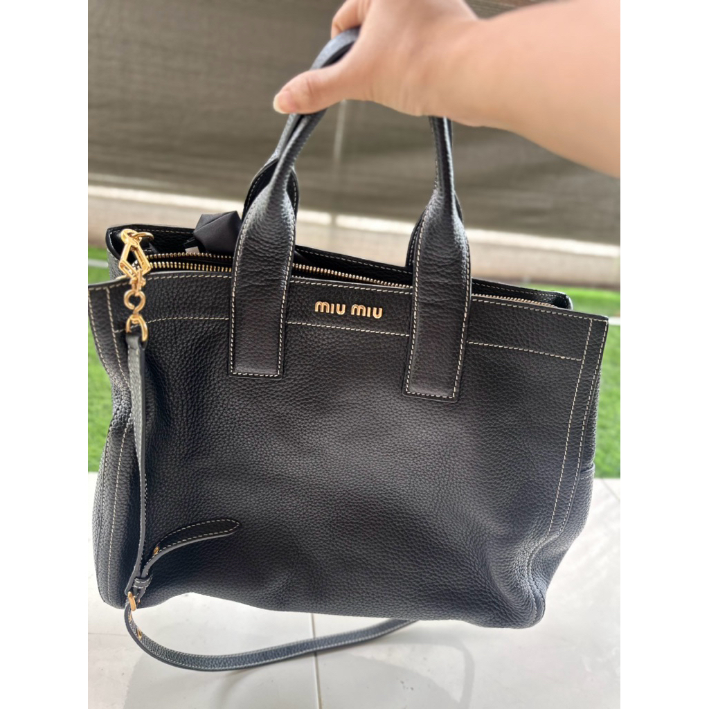 Tas miu miu vitello caribou