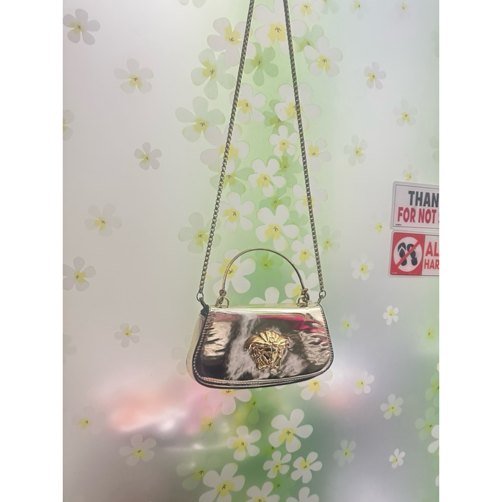 preloved tas Versace La Medusa gold patent leather mini bag