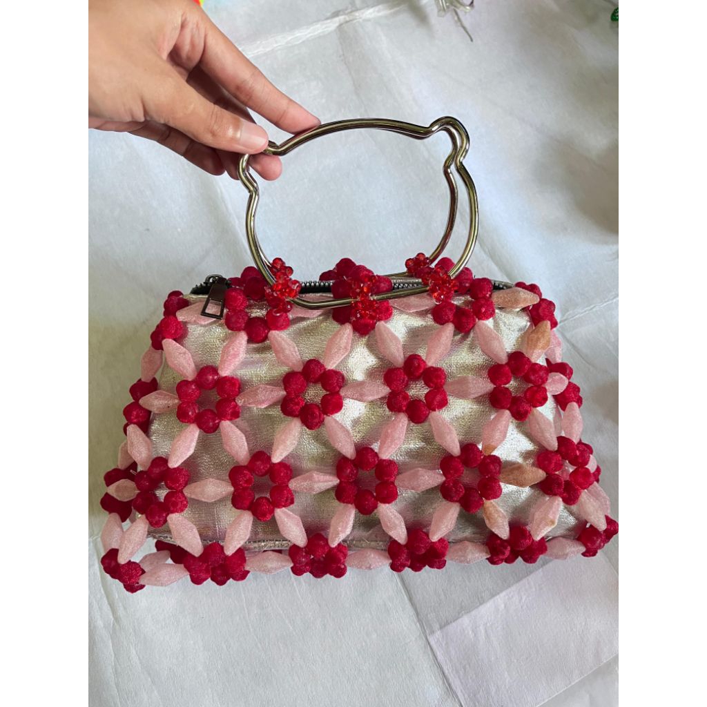 Tas Mute/Manik-manik