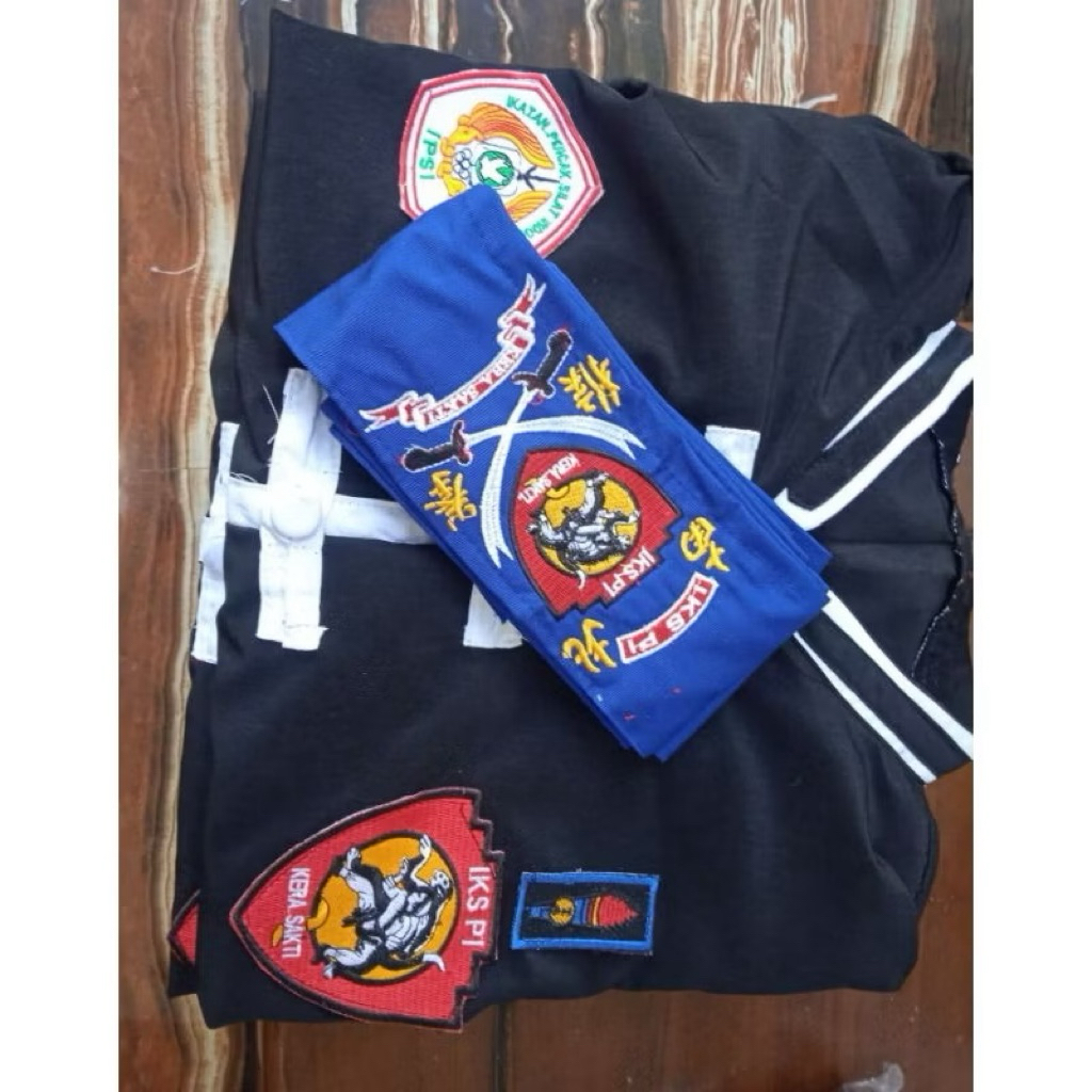 sakral ikspi kera sakti komplit sabuk baju dan celana kain tessa