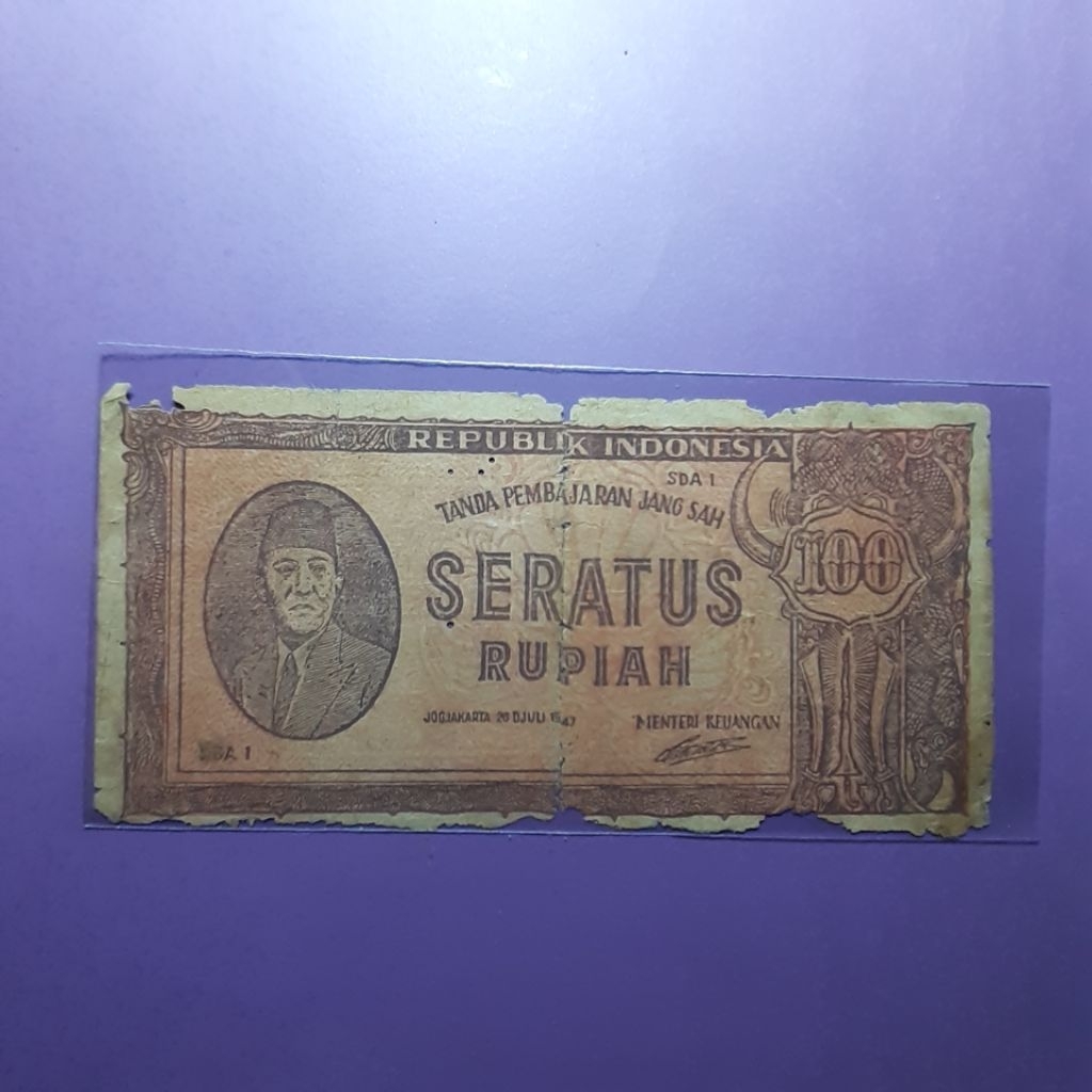 uang kuno 100 rupiah coklat 1947