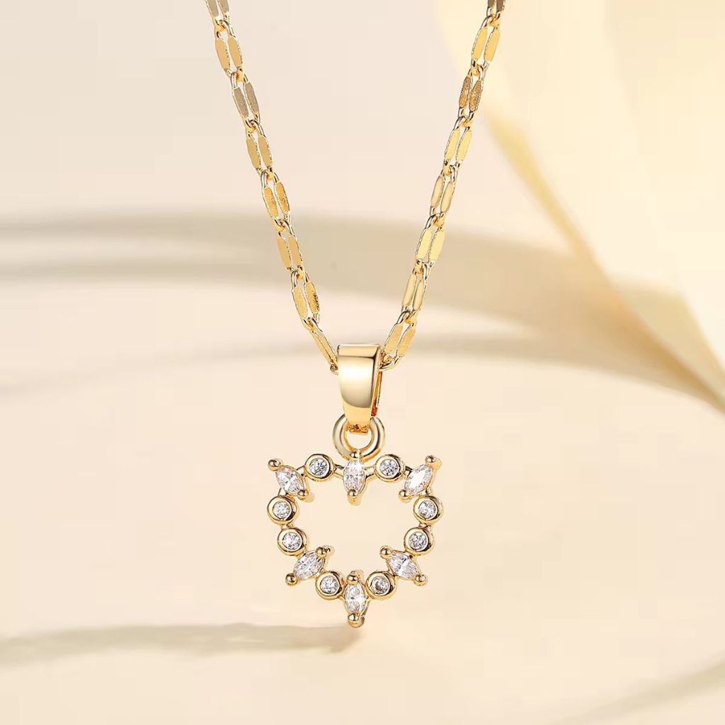 kaljng liontin permata hati titanium gold