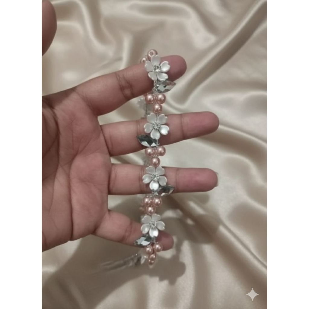 payet rangkai bunga mutiara