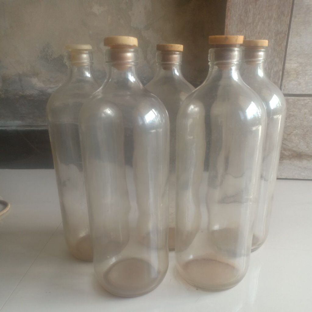 botol kaca 1 liter bekas tempat bensin