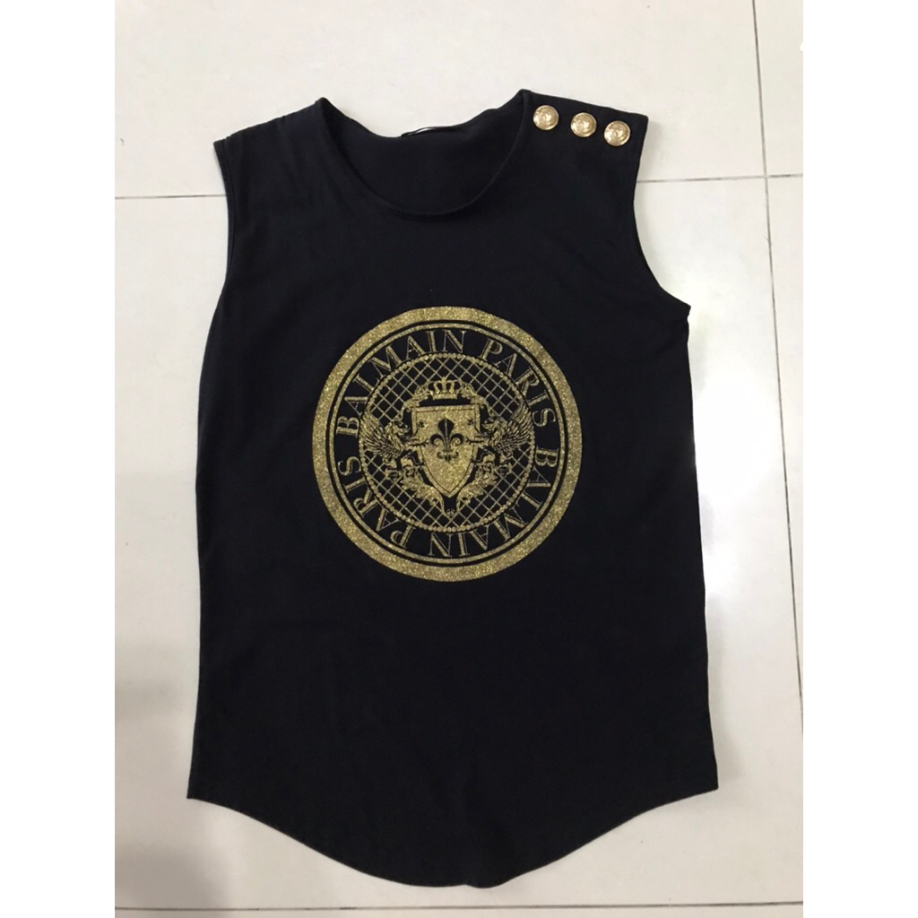 Top Sleevelles logo icon coin gold Balmain preloved