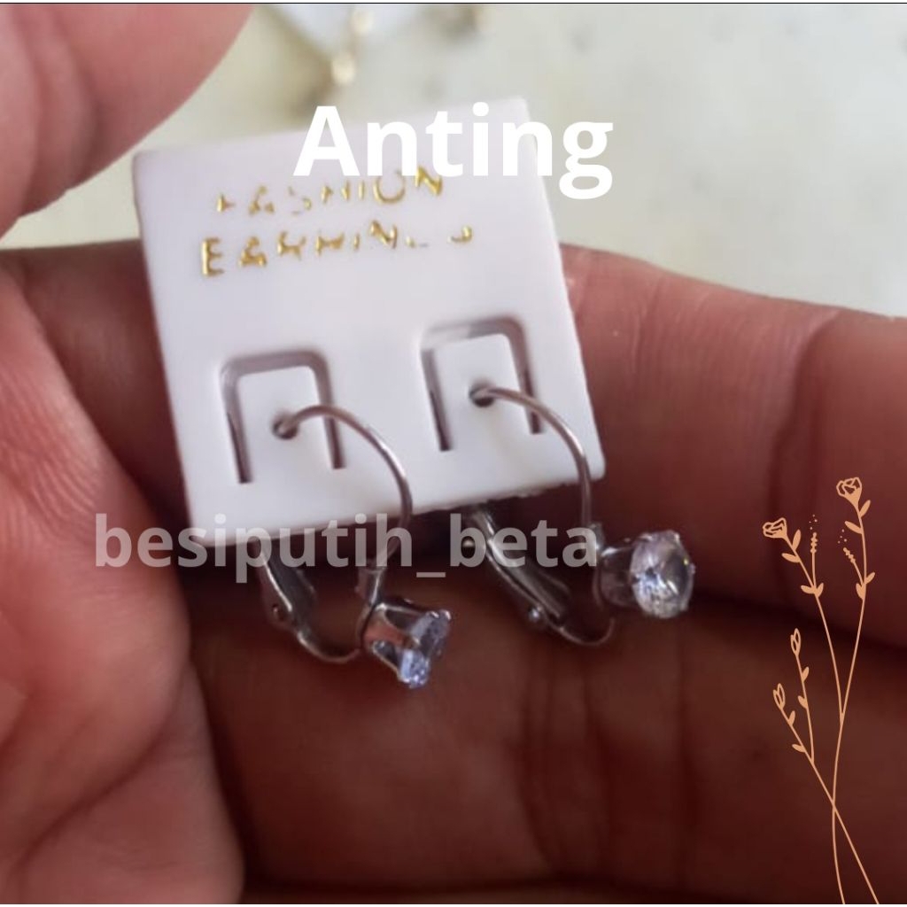 anting besi putih ambon / anting besi putih asli