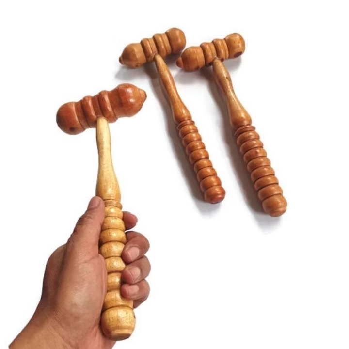 Alat pijat model pukul / alat pijat totok tradisional