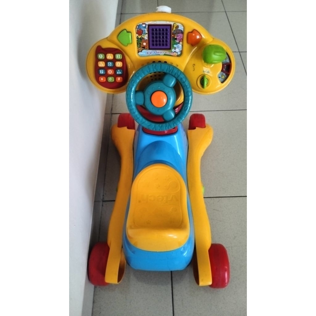 Preloved VTech Grow and go ride-on