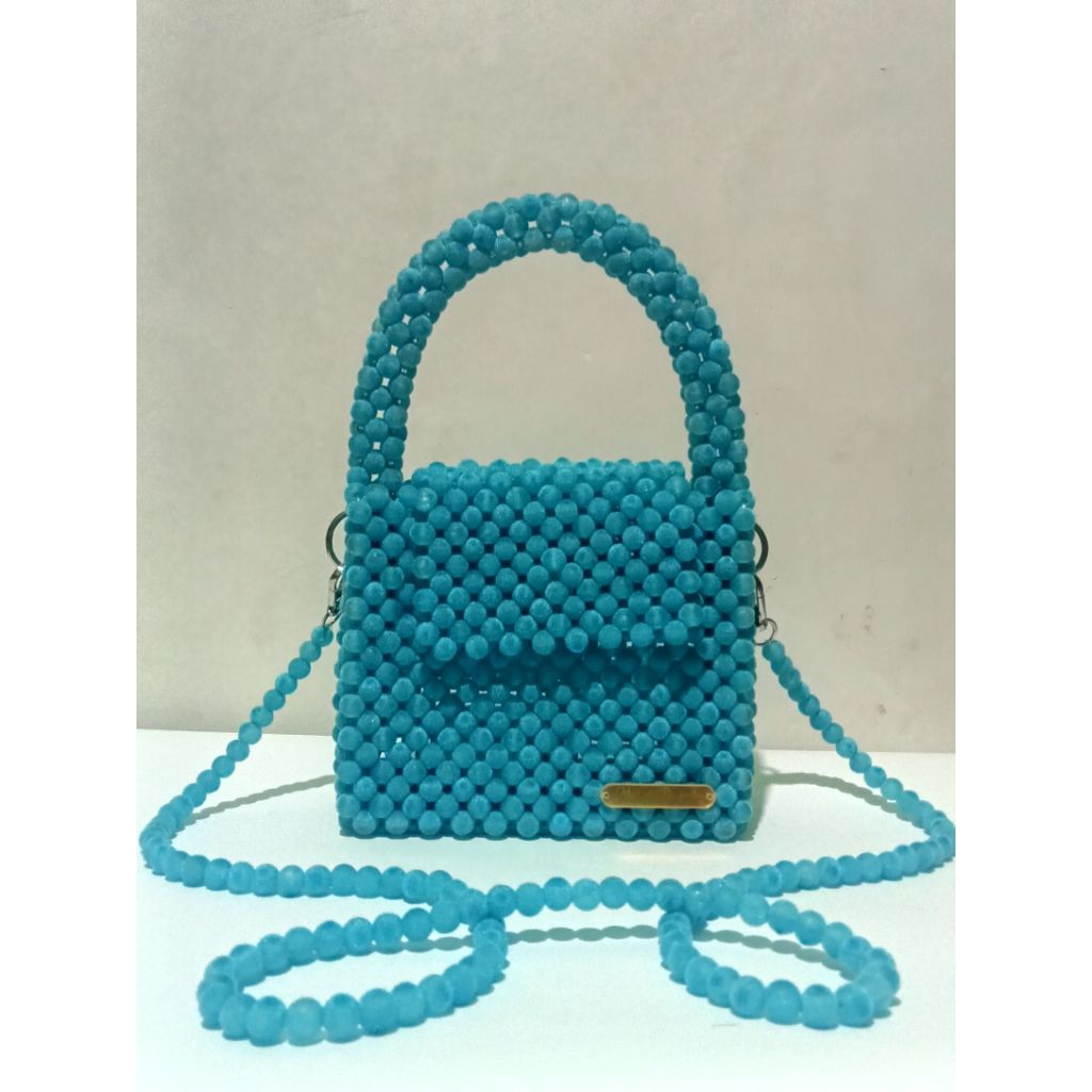 tas mutiara manik manik bludru
