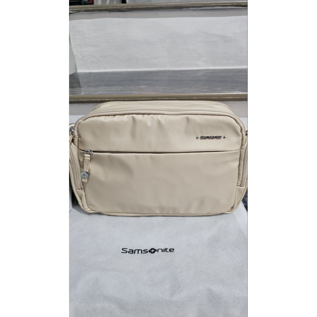Sling bag samsonite warna taupe