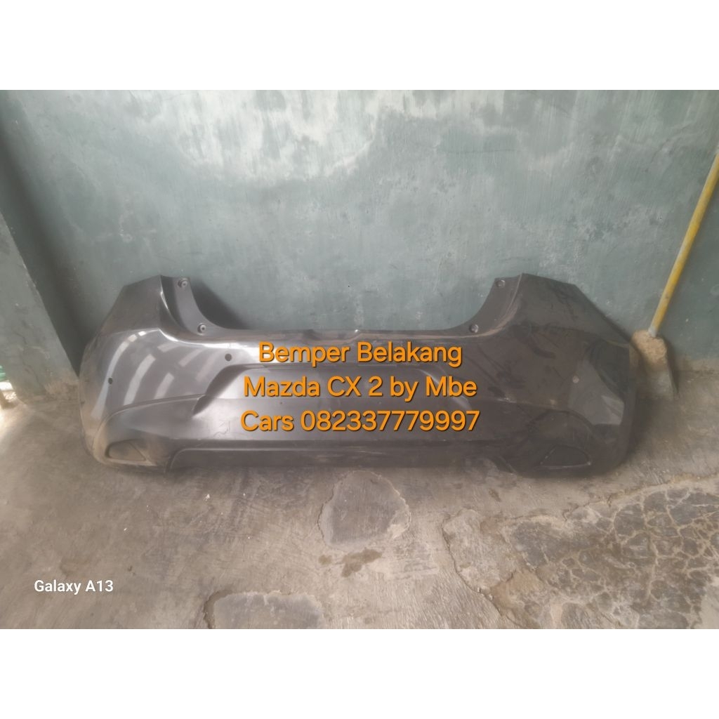 bemper belakang mazda 2