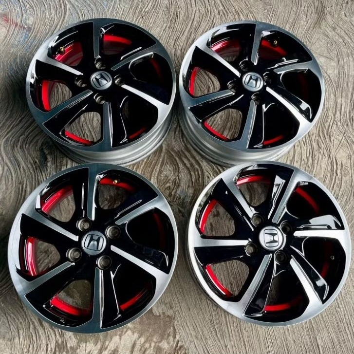 1set(4pcs) velg ori brio satya R14 PCD 4/100 kondisi bekas mazih bagus