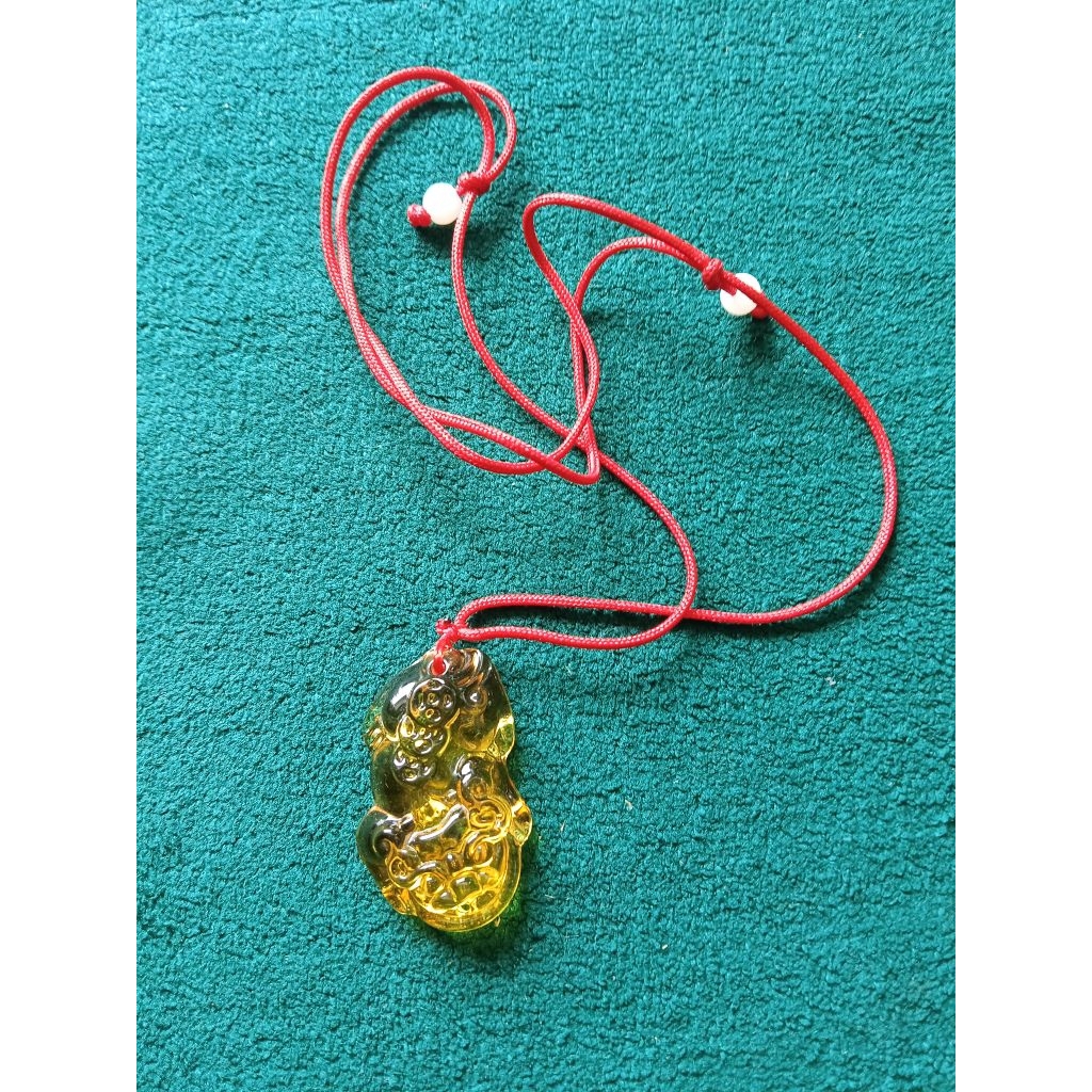 Liontin Naga
