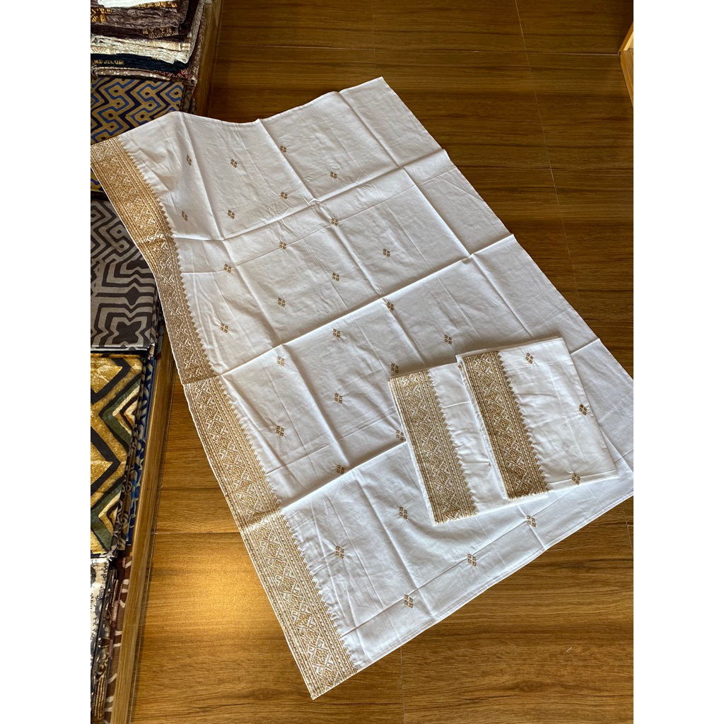 saput putih bordir klasik