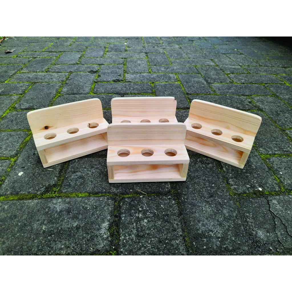 rak kayu tempat display botol parfum