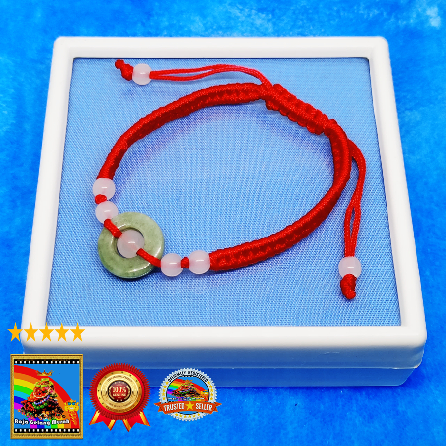 Gelang Tali Merah  Liontin Giok Donat bermata Hijau