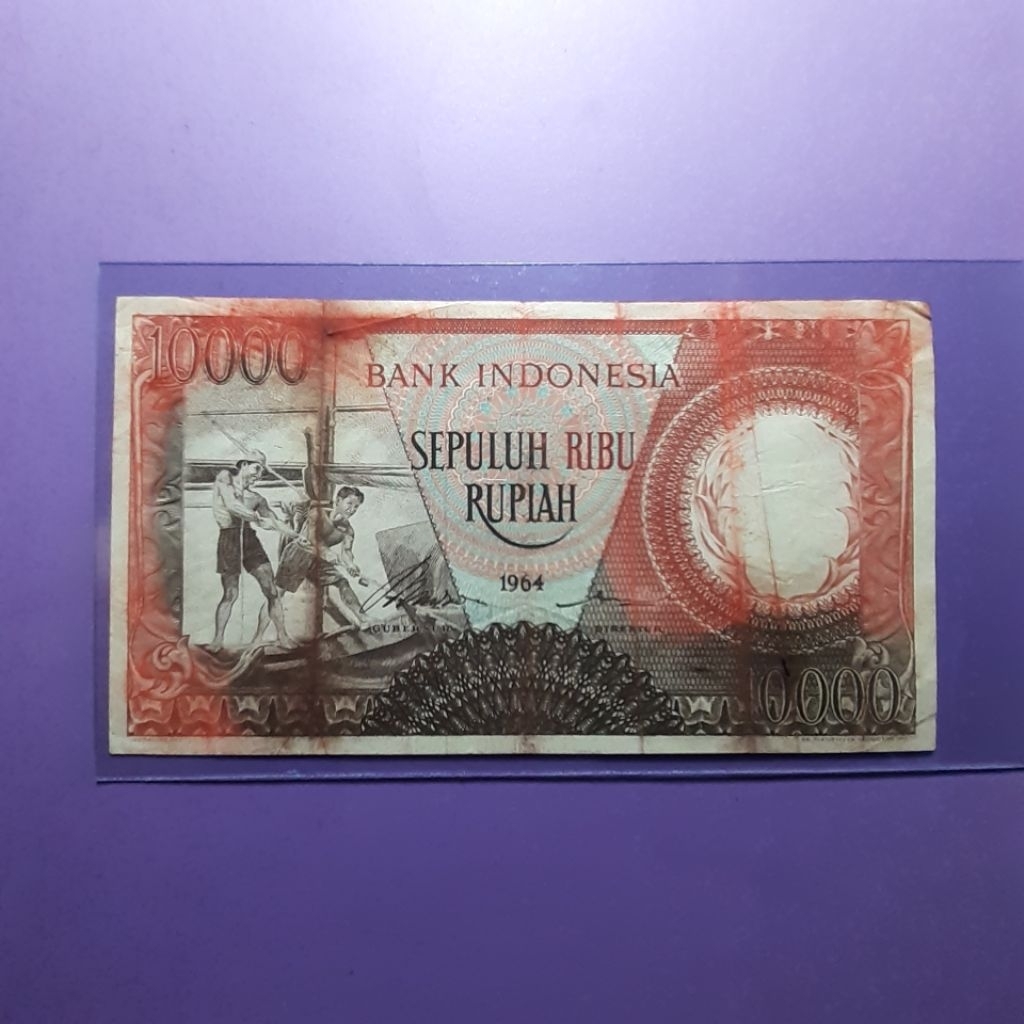 Uang 10000 rupiah pekerja 1964 merah
