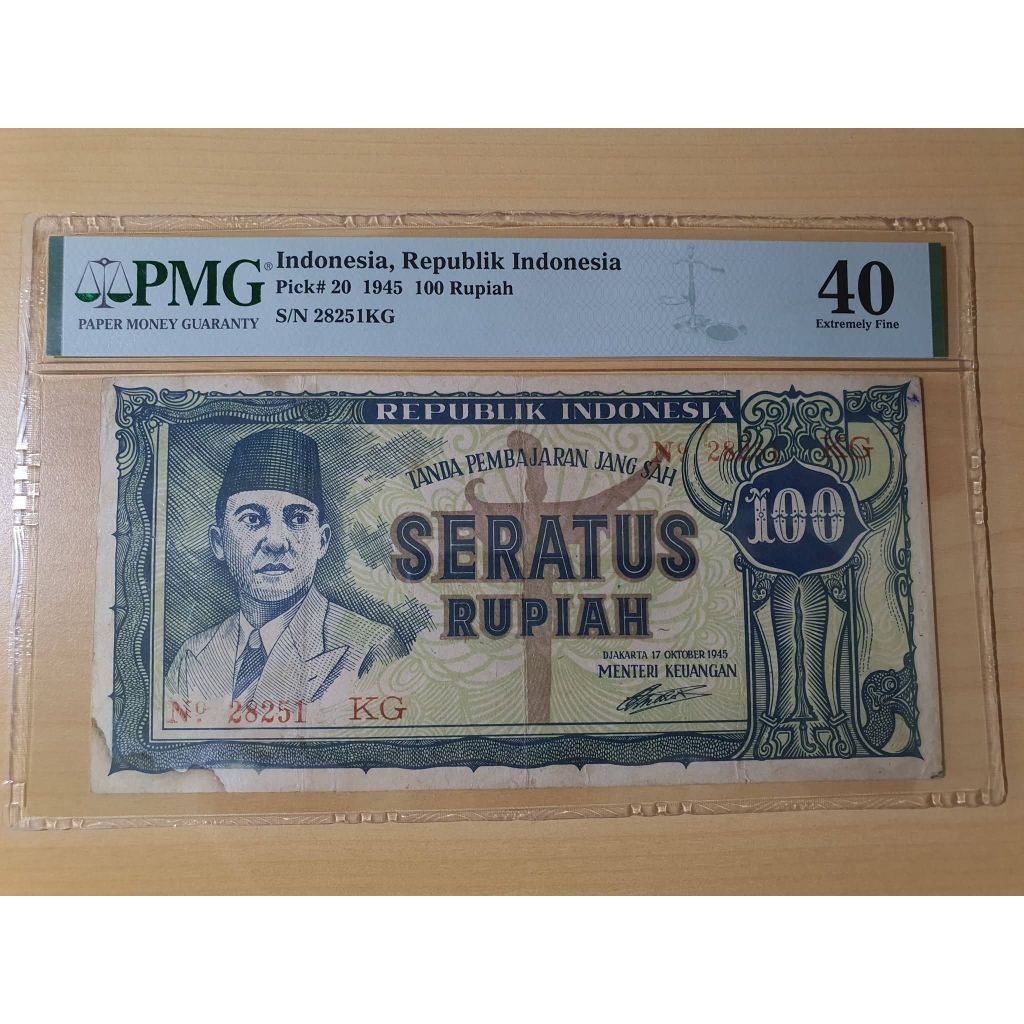 PMG SOEKARNO ORI KERIS 100 RUPIAH 1945 PMG 40 STAINS 28251KG