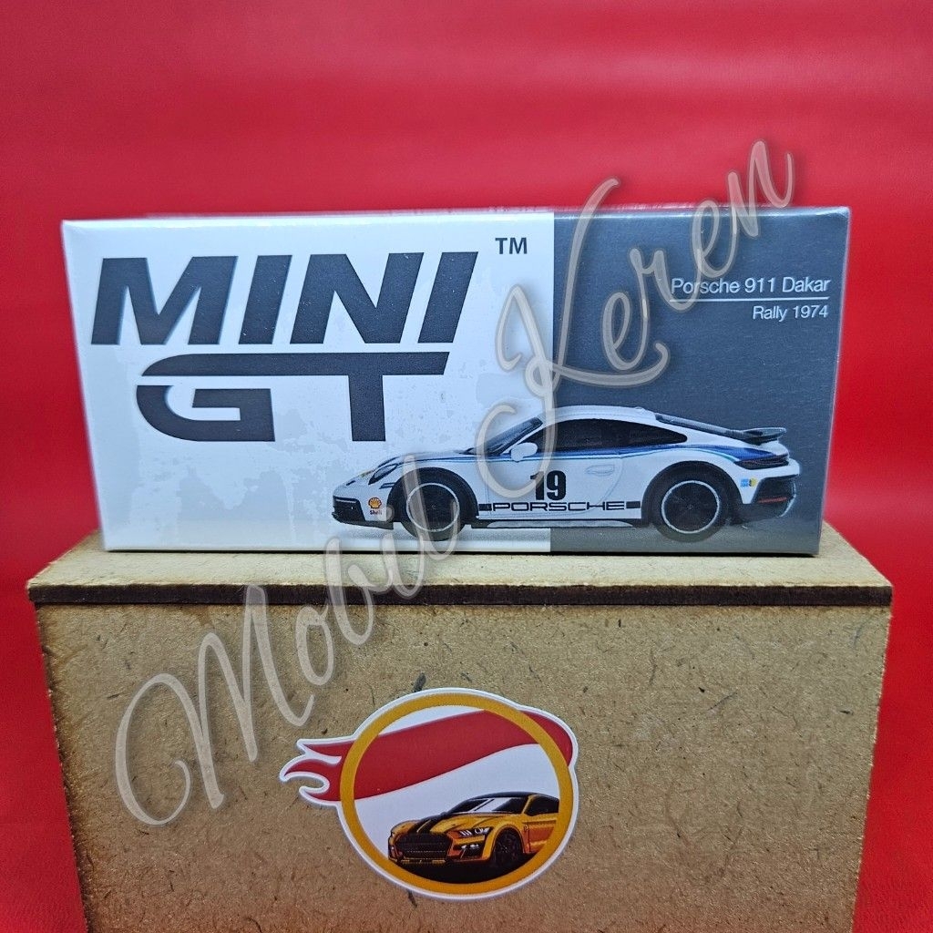 Diecast Mini GT TSM Model 1009 Porsche 911 Dakar Rally 1974 white ban karet