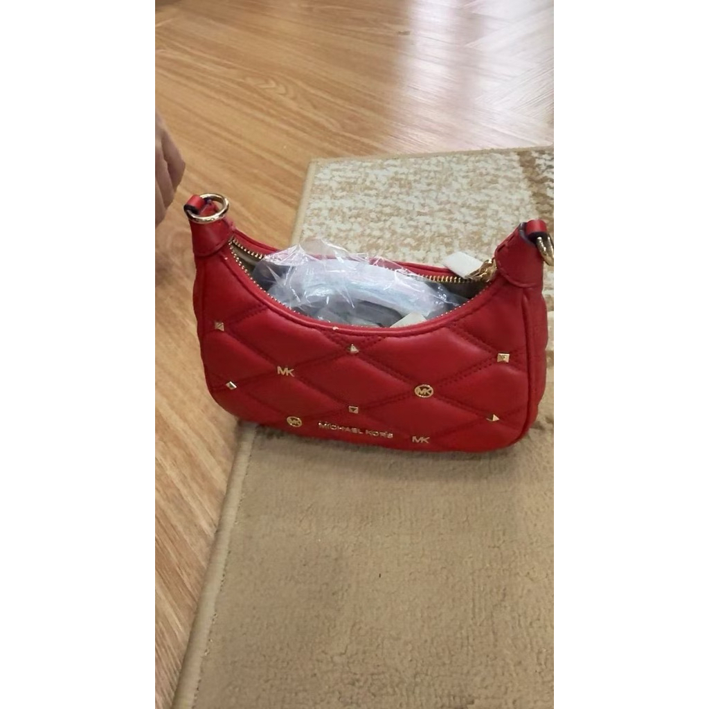 MK cora mini zip pouchette with studs