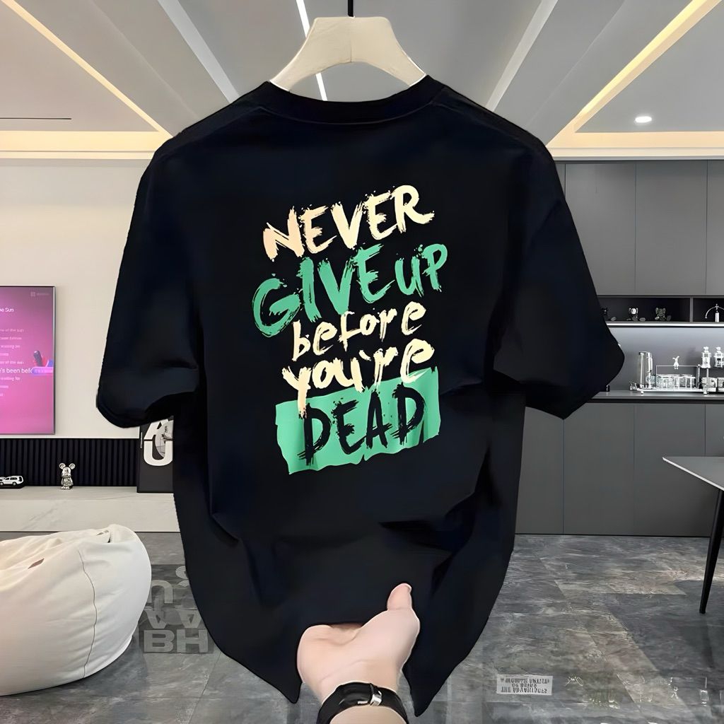 Kaos/T-shirt NEVER GIVE UP BEFORE YOU'RE DEAD_Pakaian Pria dan Wanita