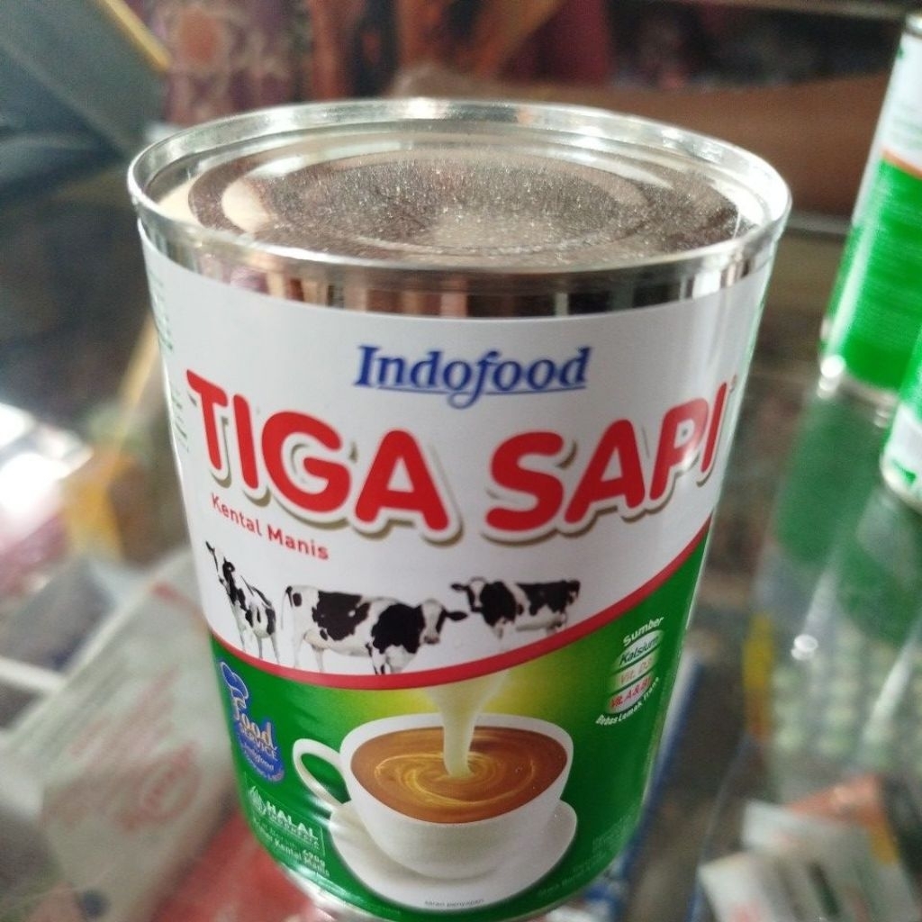 susu kaleng tiga sapi