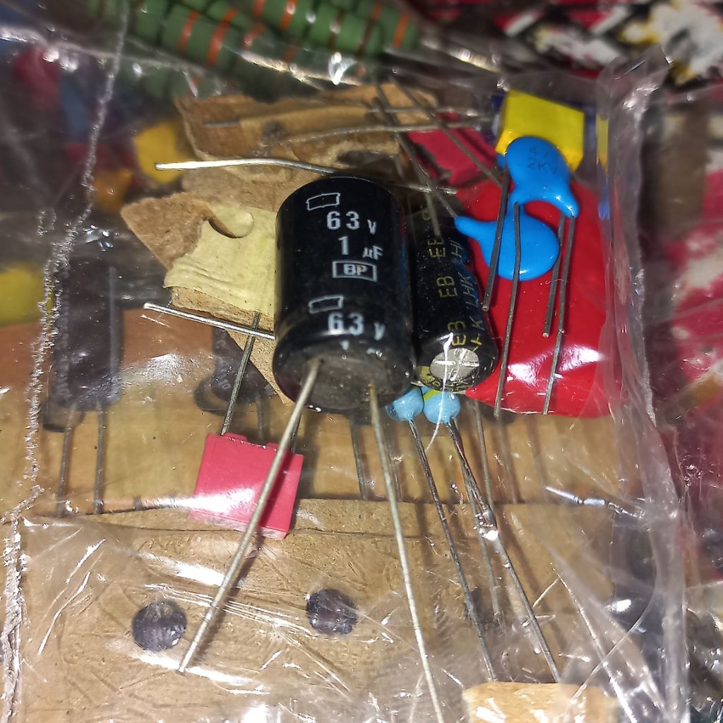 elko 1uf 50v 63v elco bipolar NP BP nonpolar 1 uf 50 v non polar NP ori bi polar kapasitor capasitor