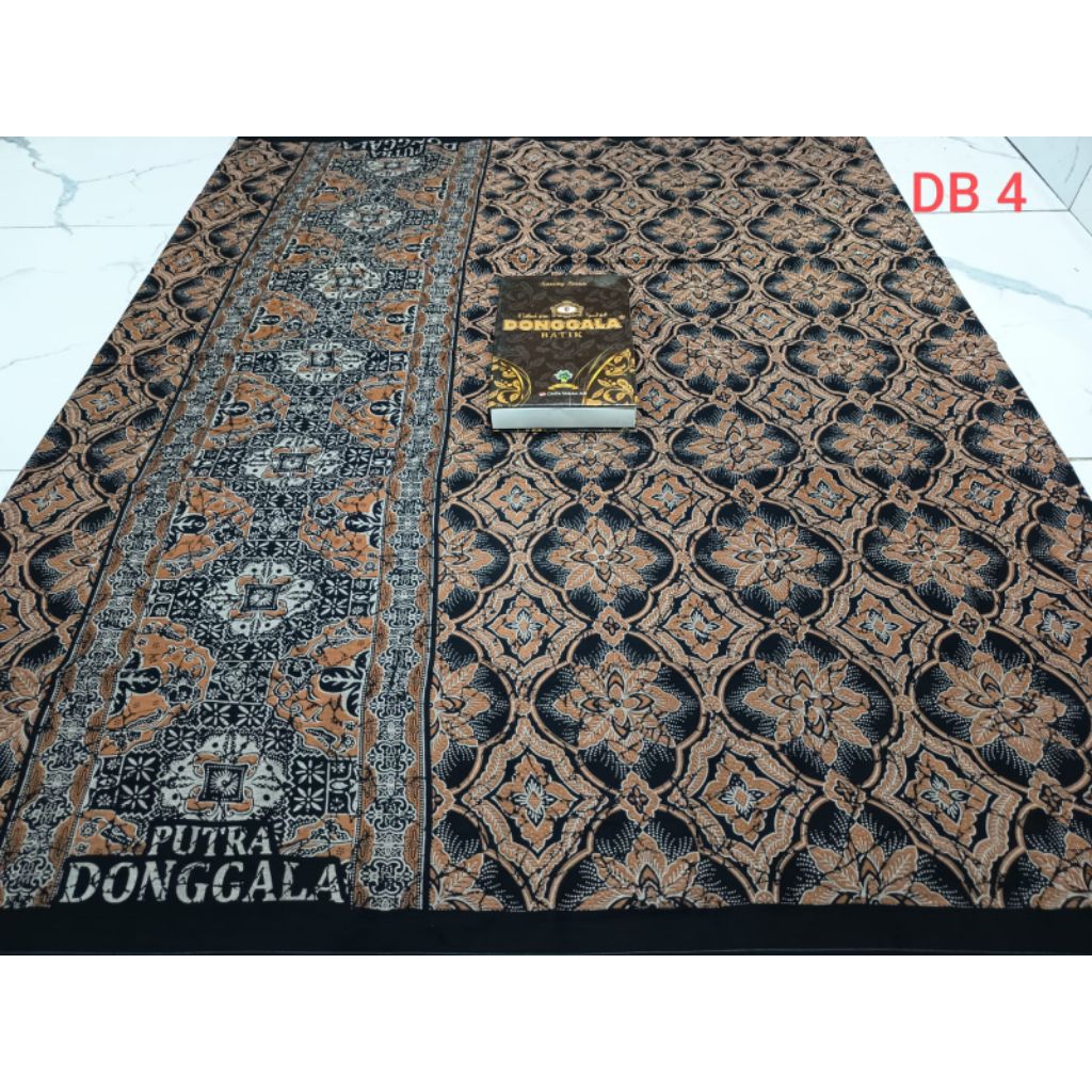 *Sarung Donggala Putra Batik**Batik Mutif**Bahan Rayon halus*
