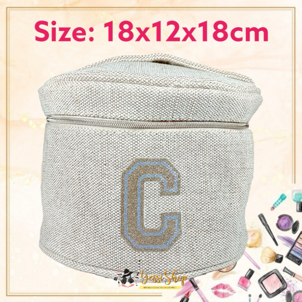 Clarins  round cosmetic pouch