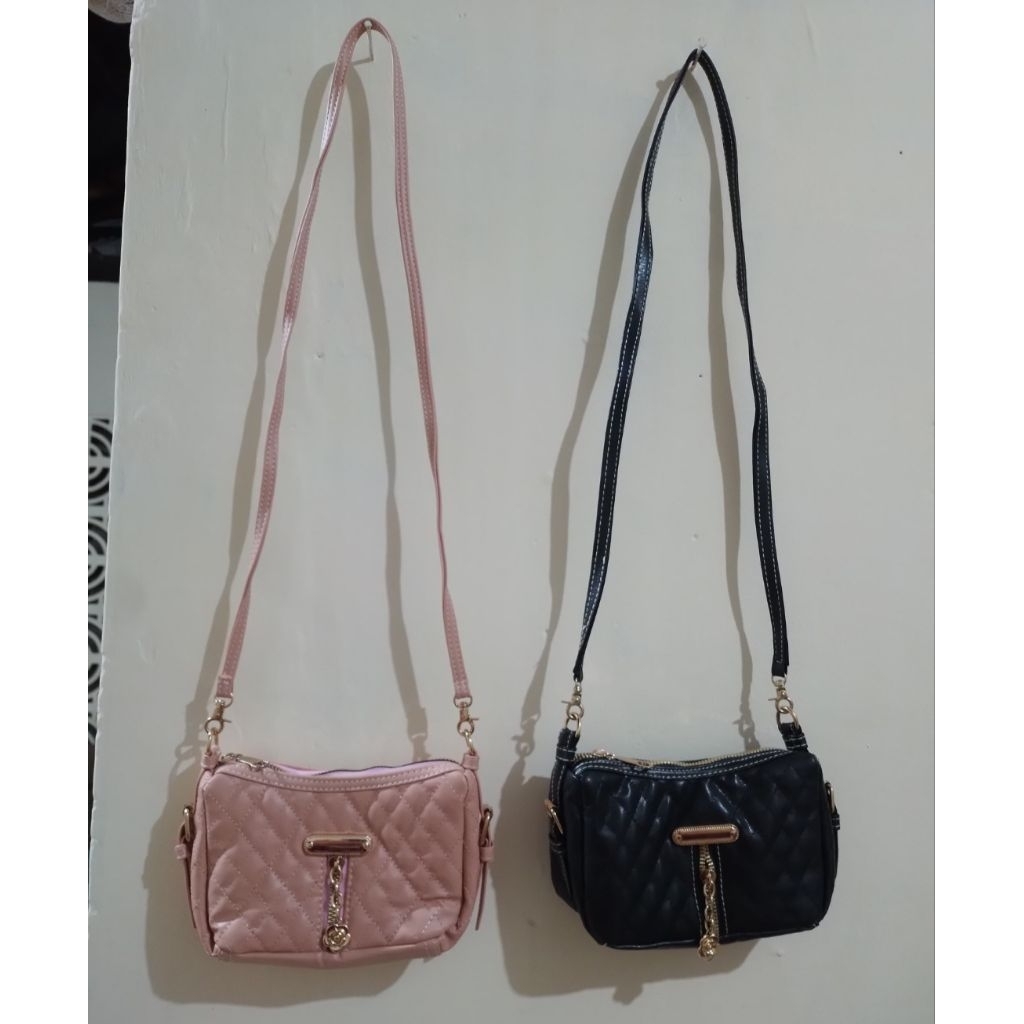 Tas selempang resleting