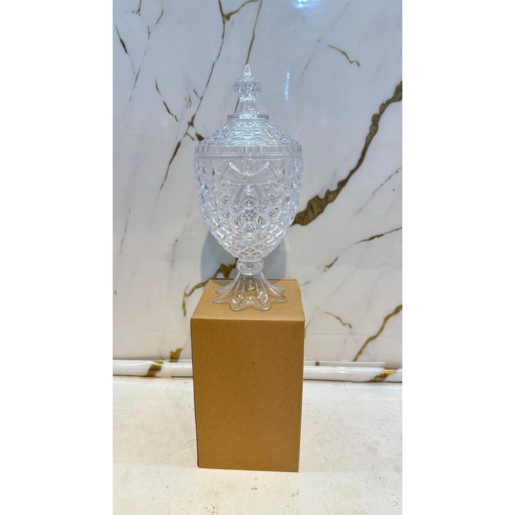 toples arwana plastik kristal